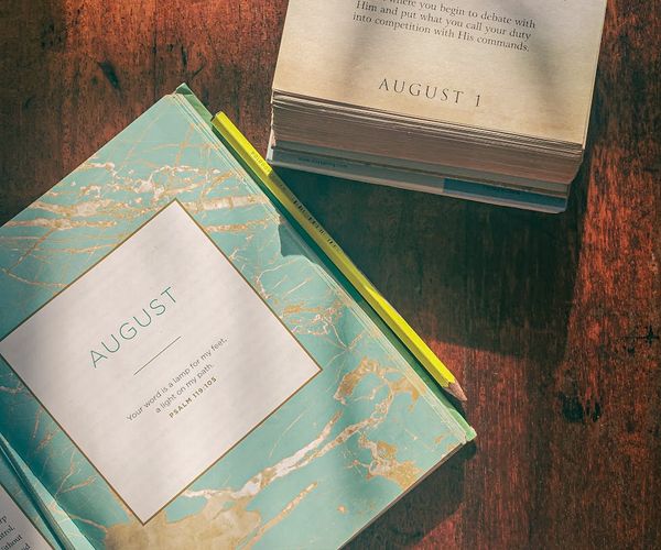 Calendar page with a checkmark, symbolizing a daily routine.